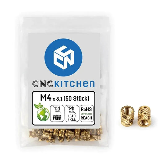 Bustina con 50 inserti filettati ottone M4 per stampanti 3D e droni, vista ravvicinata.